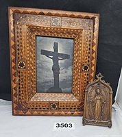 Front view of inlay frame and Virgin Mary plaque
