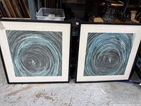 Both framed artworks side by side showing overall design and frames