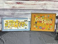 Both framed pieces side by side