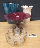 Group shot showing all four decorative pieces