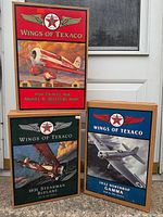 Front view of three boxed Wings of Texaco aircraft banks