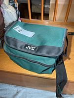 Green JVC shoulder bag closed.