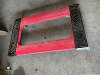 Top view showing red resin frame, black chevron pads, overall size and wear