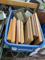 Overall view of tote with multiple wooden frames