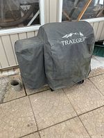 Smoker with fitted Traeger cover