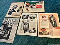 All five 1938 Life Magazine advertisement pages laid out on surface