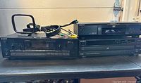 Front view of receiver, DVD player, CD changer with loop antenna and AV cables