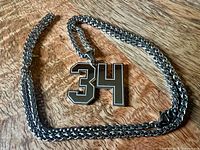 Necklace laid out showing full chain and #34 pendant front