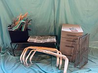 Group shot showing drawer unit, shoe rack bench, cloth bin with hangers, clear shoe organizer, white clothes bars, stainless grids