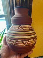Full view of vase showing shape and painted geometric design