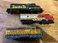 Top view of three locomotives showing liveries and numbering