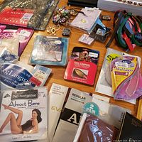 Close-up of hosiery packages and jewelry pieces