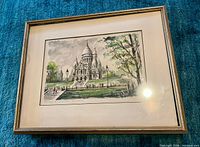 Front view of framed Gabrielle Ardant print with mat and frame