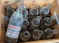 Top view of crate showing partitioned interior and Walpole bottles