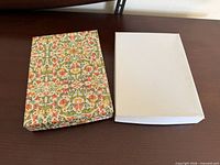 Closed patterned and plain boxes side by side