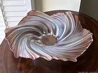 Top view showing swirl pattern and wavy rim