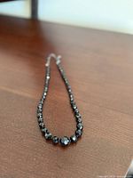 Necklace laid flat showing bead graduation