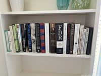 Full shelf of hardcover books