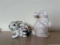 Front view of both bunny figurines