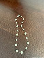 Full view of necklace showing bead spacing and clasp