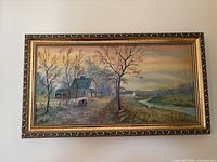 Full view of framed oil landscape painting