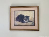 Front view of framed print on wall