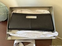 clutch in Nordstrom box with tissue paper