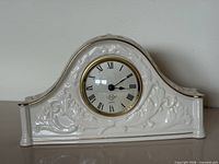 Front view of Lenox porcelain mantel clock