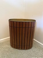 Front view of walnut slat wastebasket