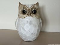 Front view showing full owl figurine details