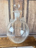 Full view showing decanter, stopper, shape and clarity