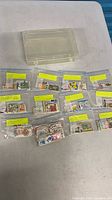 Overview of clear plastic box and multiple stamp bags on table