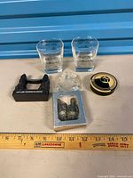 Group shot of all seven items with ruler for scale