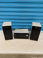 Stereo system with two speakers and receiver