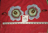 Pair of Fenton hobnail opalescent candle holders with measuring tape for scale