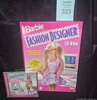 Front view of both CD-ROM packages showing titles and artwork