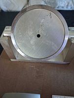 Base and side of Tiffany & Co. pendulum clock showing missing retaining nut