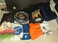 Group shot of all eight garments laid out