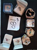 Overall shot showing eight rings each in its own box