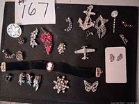 Overall view of all jewelry pieces on black background