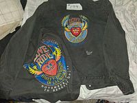 Back of jacket and bandanna showing graphic