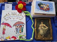 Book, plush flower, card stack, framed print