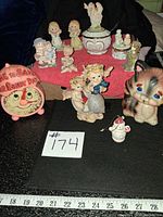 Group shot of all ceramic and porcelain items with measuring tape for scale