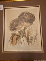 Framed print showing two children, full view with mat and frame