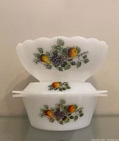casserole dish with lid and fruit bowl front view