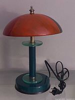 Full view of lamp showing dome shade, stem, base and cord