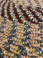 Close-up of braided wool texture and multicolor strands