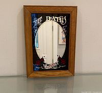 Front view of oak framed mirror showing full design