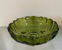 Top view showing sunflower moulding and scalloped rim