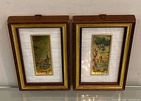 Front view of both framed serigraph prints